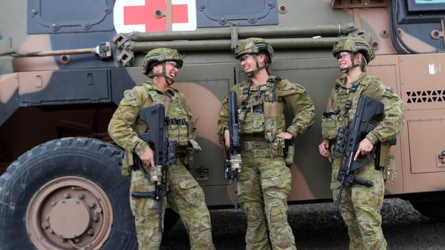 AForce Protection Element at Camp Qargha with Task Force Afghanistan. L-R: Lance Corporal Linda Keefe, 44 from Perth. Cpl Moira Walker, 27 from Eltham North (Melb). Private Chloe Hunt, 20, from Toowoomba. Picture: Gary Ramage