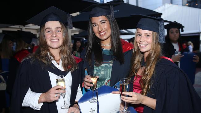 Ayesha Nicholson, Nikola Separovic and Maddi Memoli celebrate graduation. Picture: Alan Barber