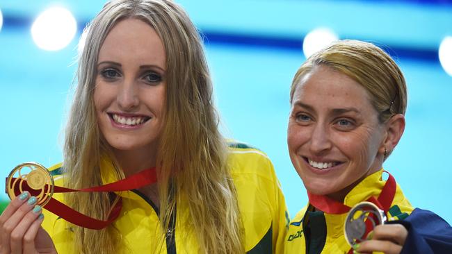 GLASGOW, SCOTLAND - JULY 26: Gold medallist Taylor McKeown (L) of Australia poses with silver medallist Sally Hunter of Australia after the medal ceremony for the Women's 200m Breaststroke Final at Tollcross International Swimming Centre during day three of the Glasgow 2014 Commonwealth Games on July 26, 2014 in Glasgow, Scotland. (Photo by Jeff J Mitchell/Getty Images)