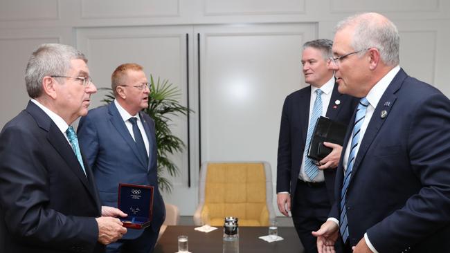 Thomas Bach and John Coates with Finance Minister Mathias Cormann and Prime Minister Scott Morrison.