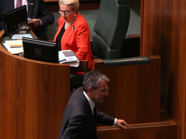 Mr Dreyfus leaves the chamber after being named by Mrs Bishop.