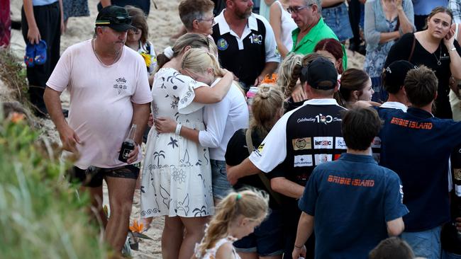 Shocked members of the Bribie Island community attended the vigil on Woorim Beach. Picture NewsWire/David Clark