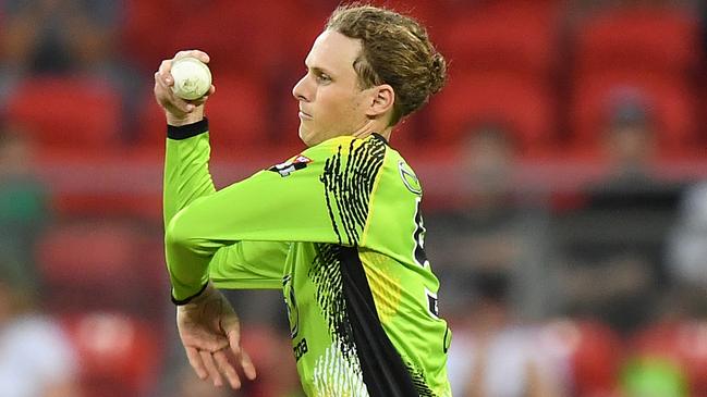 Jono Cook bowls a delivery for Sydney Thunder during last season’s Big Bash League.