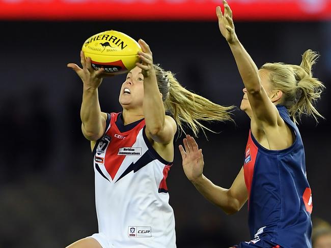 Katie Brennan (left) was one of many Falcons players to make the jump into the AFLW. Picture: Andy Brownbill