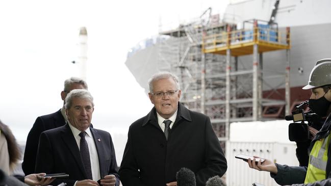 Scott Morrison, centre, claims he told Emmanuel Macron in June that the French submarines were not going to meet Australia’s needs. Picture: AFP Picture: Adam Taylor