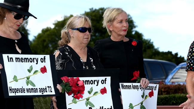 Domestic Violence Red Rose Rally at Norm Rix Park, Labrador — Dale Shales (mother of DV victim Teresa Bradford and Member for Mudgeeraba Ros Bates. Photo: David Clark