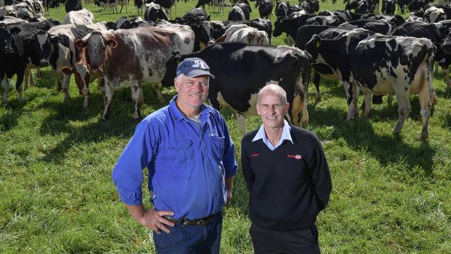 Milton farmer Robert Miller (left) with local IGA store owner Anthony Latta on Robert’s property. Picture: Simon Bullard