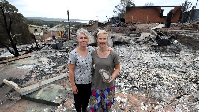 Deborah Nave (left) and Ingrid Mitchell stand among ruins. Picture: Ray Strange.