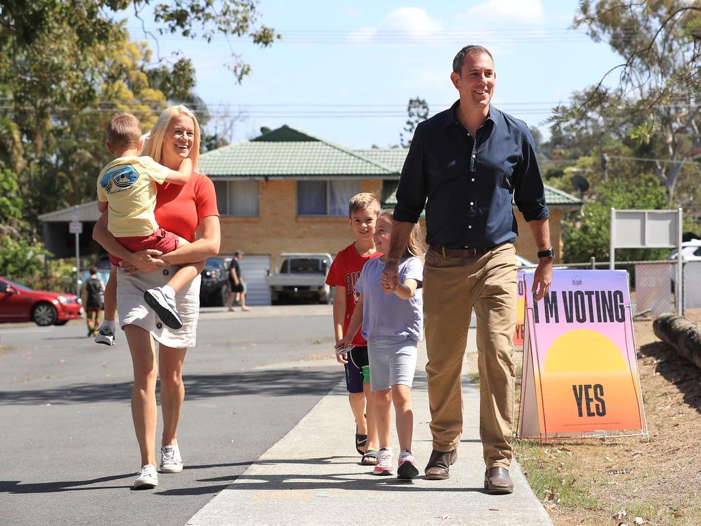 Treasurer Jim Chalmers arrives to vote with his wife Laura and children Jack 4, Annabel 6, and Leo 8 at Springwood Central State School. Picture: Adam Head