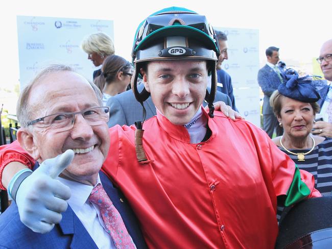 Andrew Adkins hugs trainer Ron Quinton after winning the Coolmore Classic. Picture: Getty Images