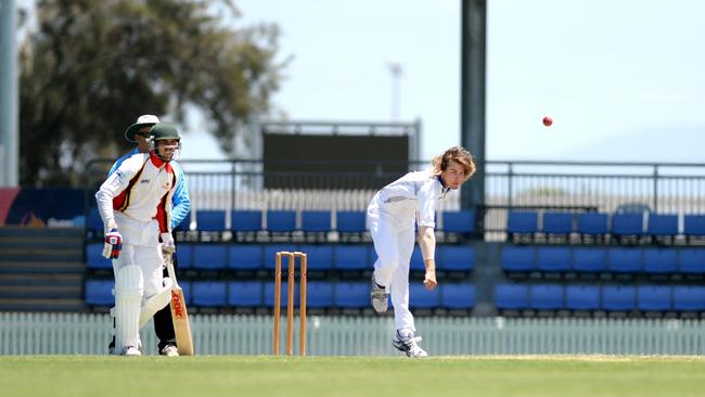 Mackay Whitsundays' Lane Kohler comes into bowl against North Queensland at Harrup Park.