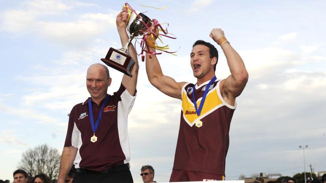 Lower Plenty coach Gary Ramsay and captain Billy Barden celebrate the club’s 2011 Division 2 premiership. Picture: Robert Mckechnie