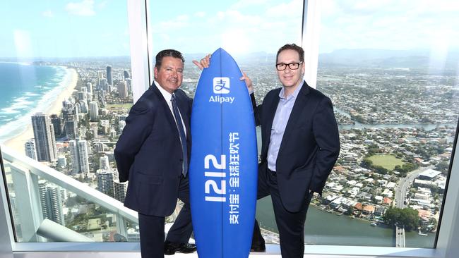 IncentiaPay is offloading Bartercard to focus on other payment systems including Alipay. Pictured is IncentiaPay CEO Iain Dunstan and George Lawson from Alipay. Picture: Glenn Hampson