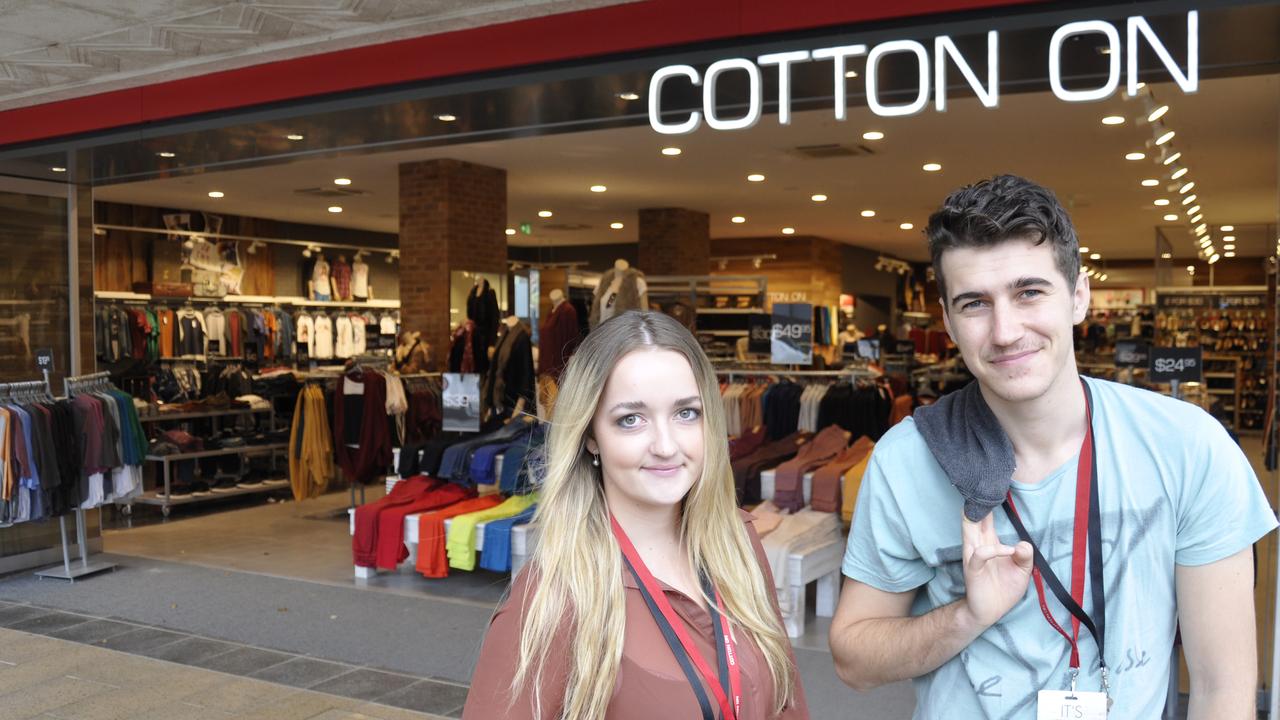 Cotton On Toowoomba retail assistants Taela Coles (left) and Enoch Mayer in front of the new Ruthven St store on the site of the burnt down Owen RayÃ¢â&#130;¬â&#132;¢s International Music, Tuesday, April 24, 2012 Photo Stuart Cumming / The Chronicle