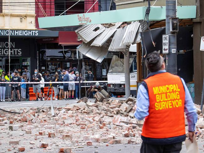 MELBOURNE, SEPTEMBER 22, 2021: Debris is seen in Chapel Street, Windsor after an earthquake that has destroyed burger shop, BettyÃs Burgers. Picture: Mark Stewart