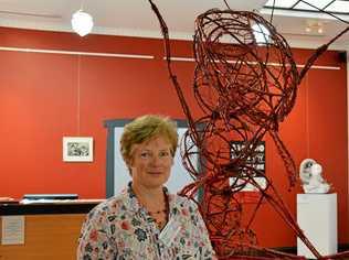 Kingaroy Regional Art Gallery art director Catherine Woodham with one of the sculpture entries. Picture: Madeline Grace