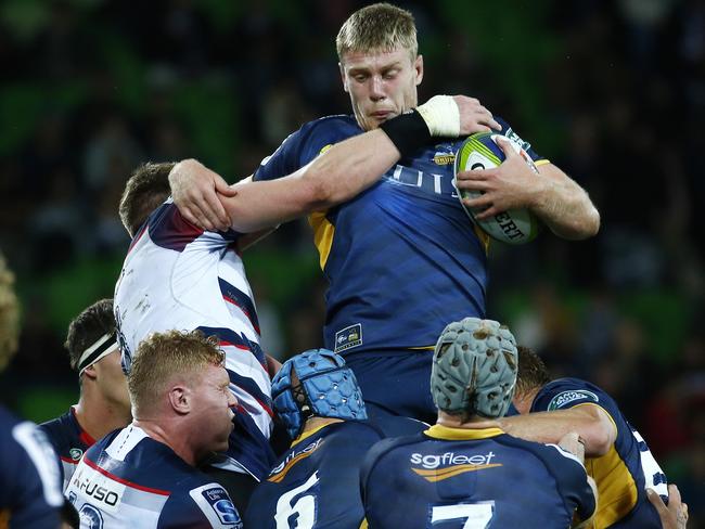 Super Rugby - Melbourne Rebels V Brumbies at AAMI Park , Brumbies Tom Staniforth gets a whack from Rebels Adam Thomson in the line out. 13th May 2016. Picture: Colleen Petch.