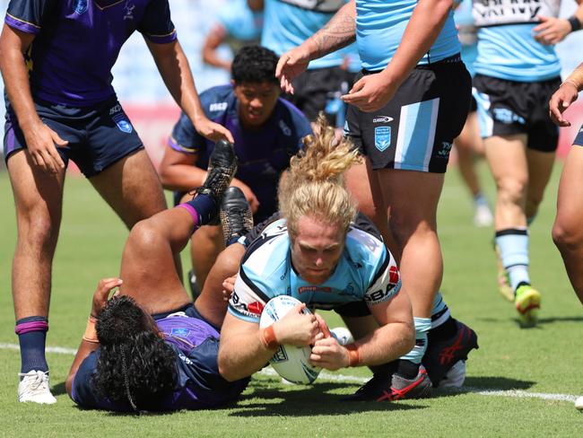 Samuel McCulloch dives over to score a try in SG Ball. Picture: Steve Montgomery