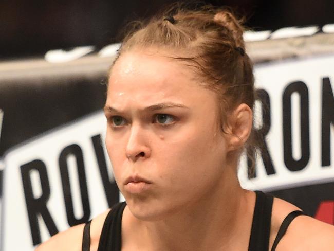 LOS ANGELES, CA - FEBRUARY 28: Ronda Rousey enters the Octagon in her UFC women's bantamweight championship bout against Cat Zingano during the UFC 184 event at Staples Center on February 28, 2015 in Los Angeles, California. (Photo by Harry How/Getty Images)