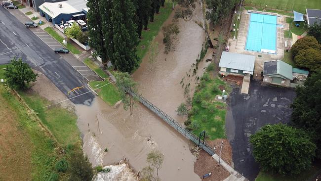 An aerial view over Myrtleford, showing the swollen river at Happy Valley Creek. Picture: Alex Coppel