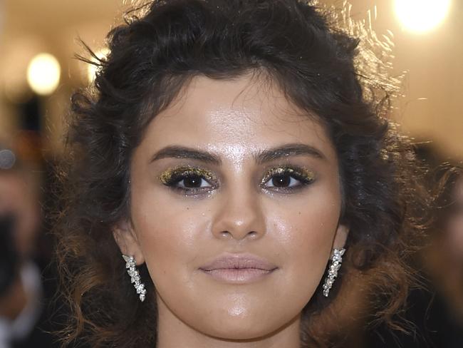 Selena Gomez attends The Metropolitan Museum of Art's Costume Institute benefit gala celebrating the opening of the Heavenly Bodies: Fashion and the Catholic Imagination exhibition on Monday, May 7, 2018, in New York. (Photo by Evan Agostini/Invision/AP)