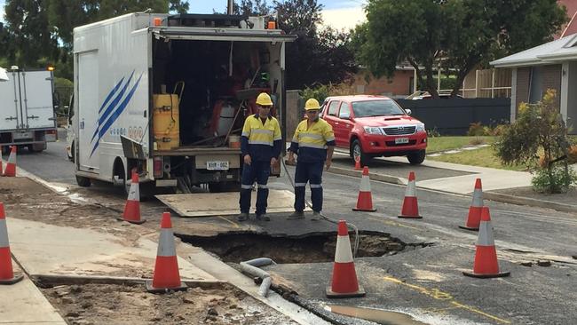 The remains of the road after the water main burst. Picture: Nithin Mathai