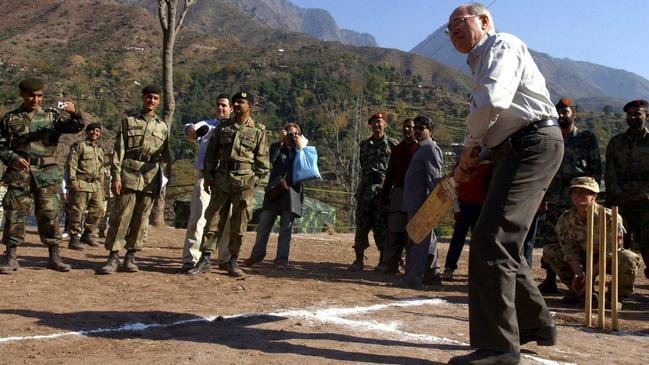 Former Prime Minister John Howard’s batting style has drawn strong praise from Mike Hussey and Michael Vaughan. Picture: AP Photo/Department of Defence, Cpl Neil Ruskin/Australian Army)