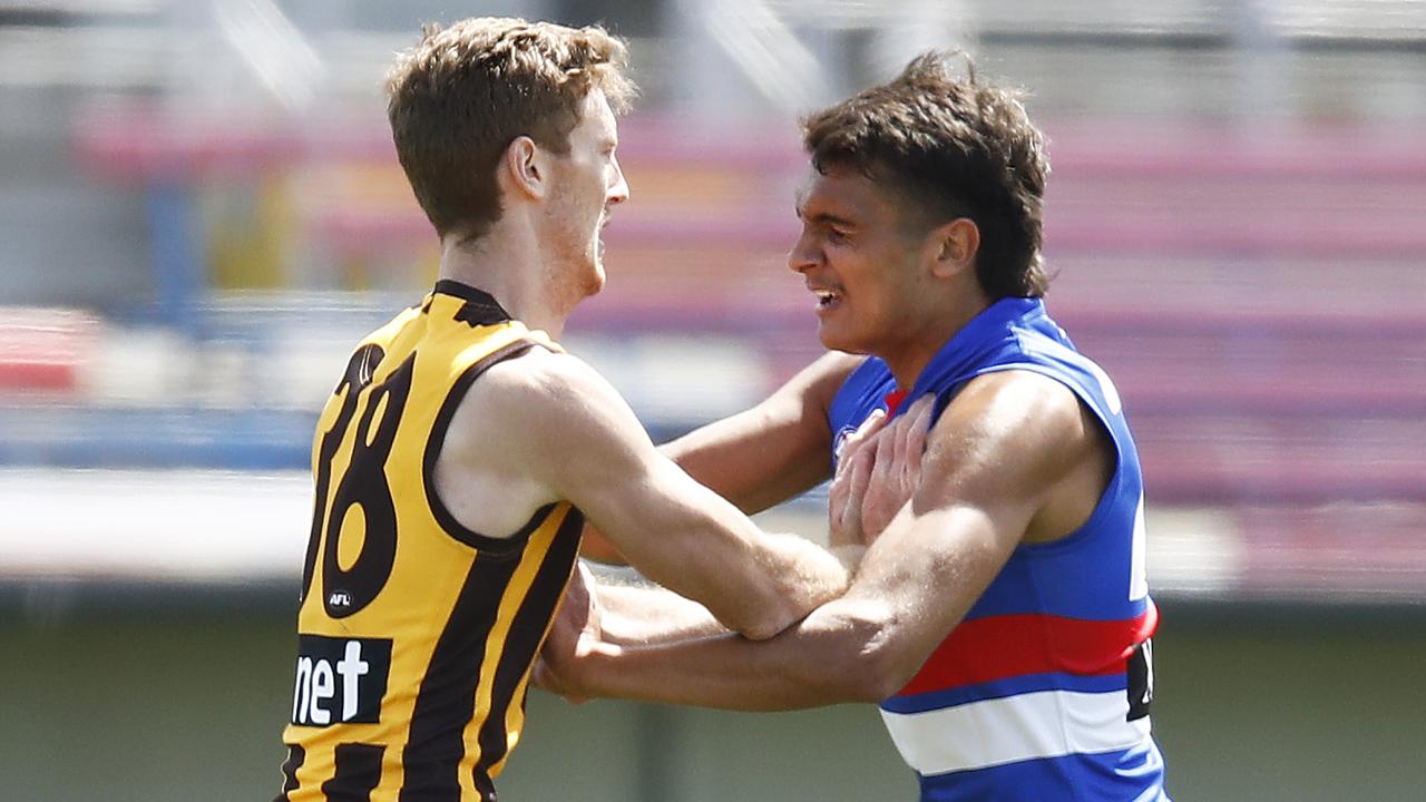 Hawk Denver Grainger-Barras, pictured competing against No. 1 pick Jamarra Ugle-Hagan, will make his debut on Sunday. Picture: Daniel Pockett/AFL Photos