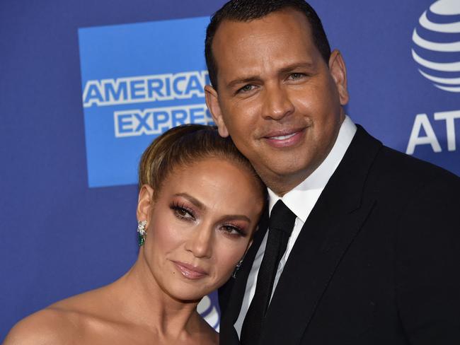 (FILES) In this file photo taken on January 2, 2020 US actress Jennifer Lopez (L) and partner US former baseball player Alex Rodriguez arrive for the 31st Annual Palm Springs International Film Festival (PSIFF) Awards Gala at the Convention Center in Palm Springs, California. - Jennifer Lopez and fiance Alex Rodriguez have broken up, calling off their two-year engagement, US media reported on March 12, 2021. (Photo by Chris Delmas / AFP)