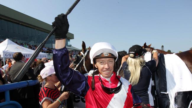 Retiring jockey legend Michael Cahill, pictured in 2013 after what he says was his best big race ride, scoring the Gold Coast Magic Millions 2YO Classic aboard Real Surreal. Picture: Darren England