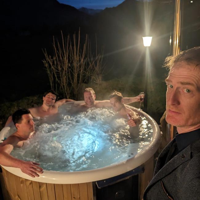 Eight men in a hot tub. Photo: Courtesy of Matt Morgan