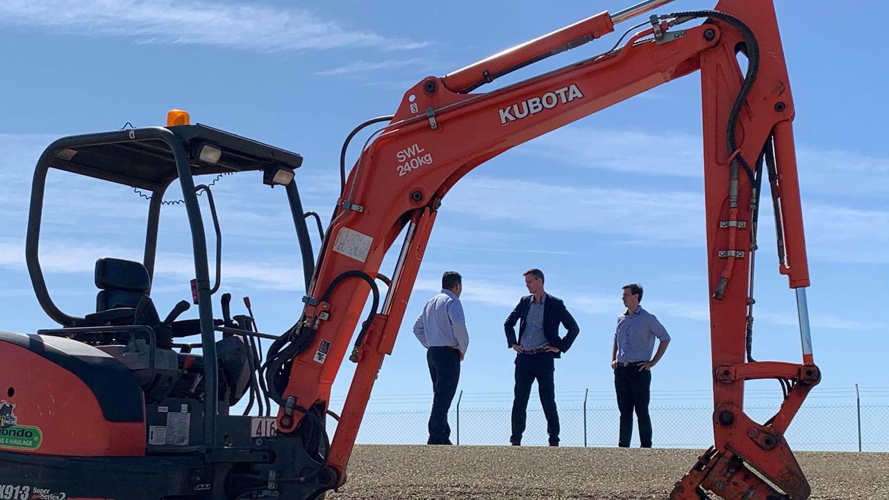 PORT PLANS: Minister Mark Bailey, Bundaberg Labor candidate Tom Smith and Pacific Tug Group CEO Chris Peters at the Port of Bundaberg.