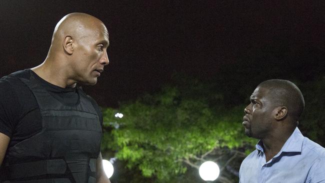 Dwayne Johnson and Kevin Hart in a scene from the movie Central Intelligence. Universal Pictures.