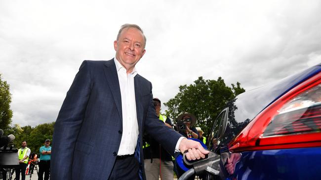 Anthony Albanese charges an electric car at charger manufacturer Tritium in Brisbane. Picture: NCA NewsWire / Dan Peled