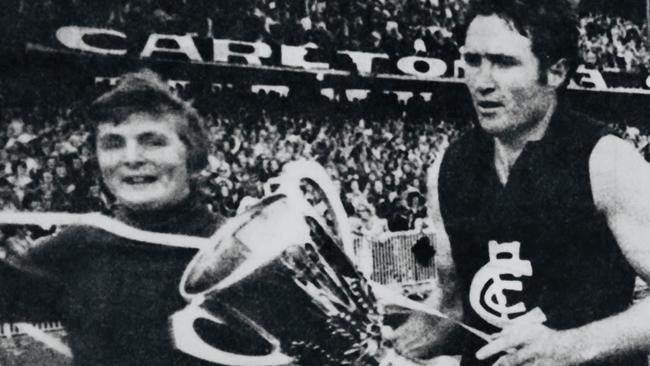 Macca, from Mount Waverley, with Carlton's John Nicholls and the VFL premiership cup in 1972.