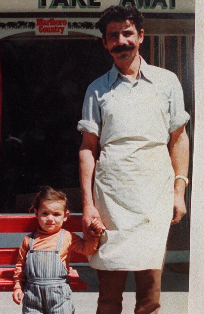 Mersina Halvagis, aged 4, with her dad George Halvagis, outside their shop in Warracknabeal in 1976.