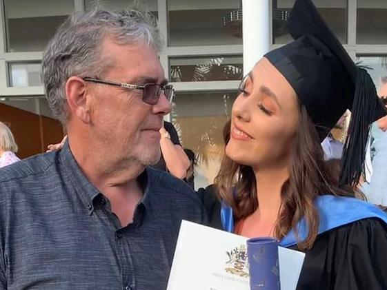 Walter Newton with daughter Maddie on her graduation day.