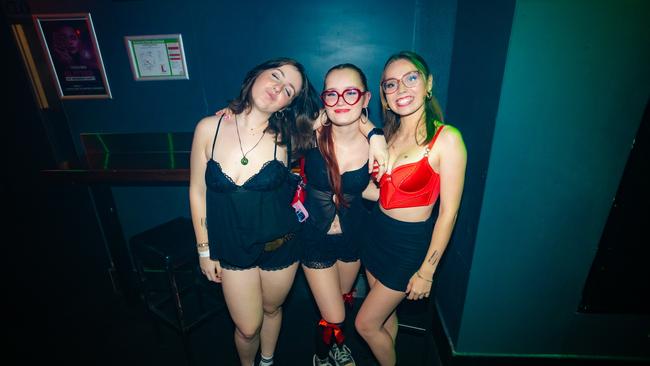 Lola Caffery, Zeane Dwinger and Caleigh Dwinger at Cocktails Nightclub. Picture: Lucas Linck