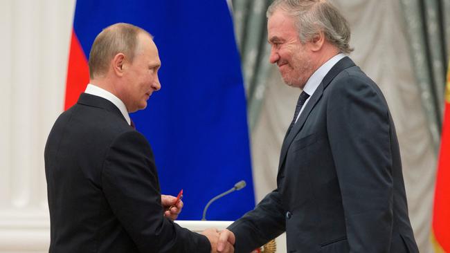 Vladimir Putin presents a medal to then Mariinsky Theatre's Artistic Director Valery Gergiev during a ceremony at the Kremlin in 2016. Picture: AFP