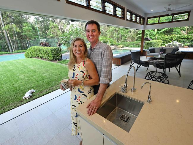 24/12/2024: Megan and Brett Williamson , son Cormac and their dog Lila,, at their home which they are selling in Kenmore Hills, Brisbane. pic: Lyndon Mechielsen/Courier Mail