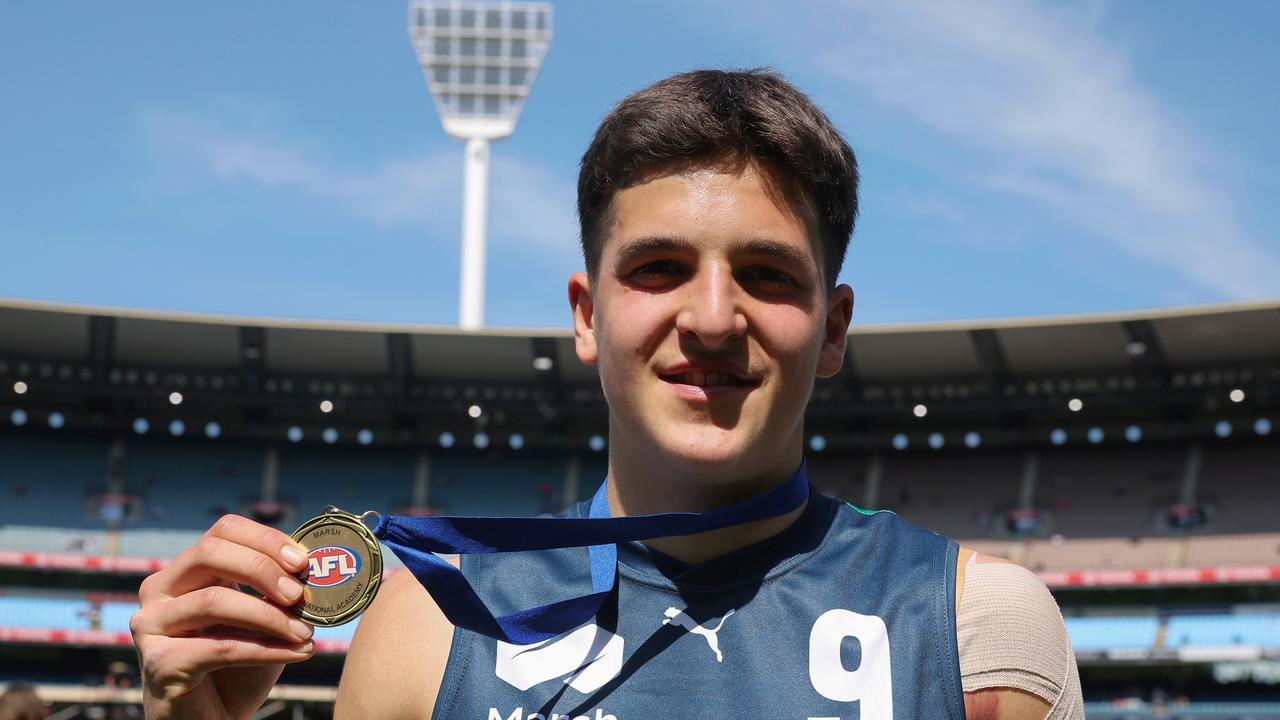 Josh Lindsay with his U17 futures match medal. Picture: Daniel Pockett/AFL Photos/via Getty Images