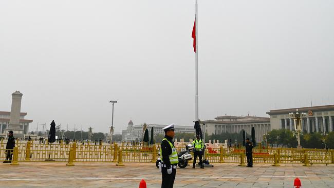 The flag flies at half-mast for former Chinese premier Li Keqiang at Tiananmen Square in Beijing on Thursday. Picture: AFP