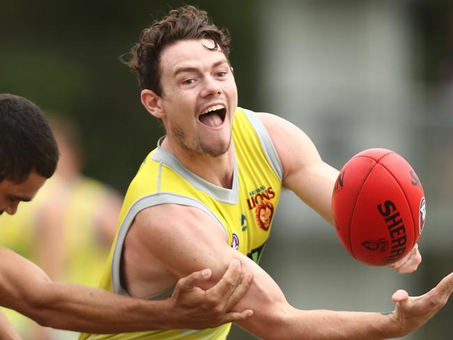 BRISBANE, AUSTRALIA - FEBRUARY 26: Lachie Neale handballs during a Brisbane Lions joint AFLW & AFL Media Opportunity at Giffin Park on February 26, 2019 in Brisbane, Australia. (Photo by Chris Hyde/Getty Images)