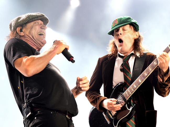 LOS ANGELES, CA - SEPTEMBER 28:  Singer Brian Johnson (L) and musician Angus Young of AC/DC perform at Dodger Stadium on September 28, 2015 in Los Angeles, California.  (Photo by Kevin Winter/Getty Images)