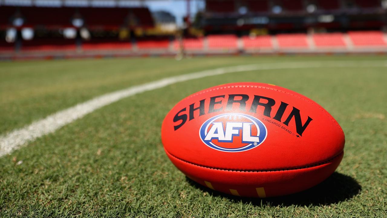 Footy player dies after collapsing in game