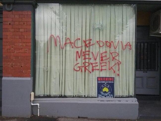 Bullet holes in the wall of a building used by the Pan-Macedonian Association of Melbourne and Victoria.