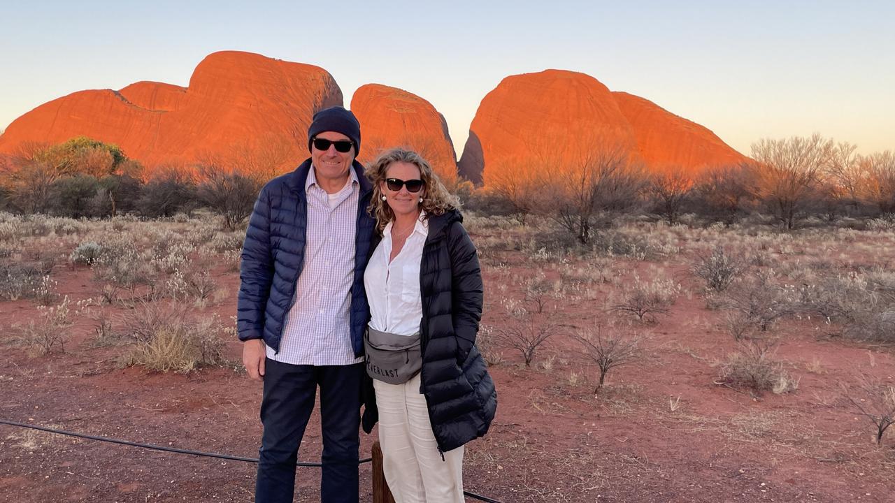 Paul and Cherie soak in a magical sunset at Kata Tjuta.