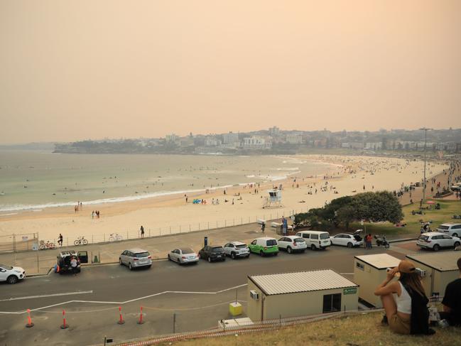 Heavy smoke hovers over Bondi. Picture: Christian Gilles