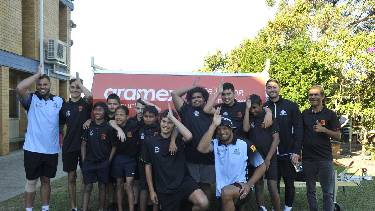 Cronulla Sharks players Shaun Johnson, Wade Graham and Will Chambers visit Orara High School. Sharks major sponsor Aramex made a $5000 donation to the Clontarf Foundation which operates at the school.