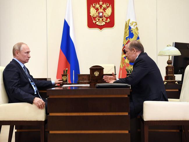 Russia's President Vladimir Putin (L) and Alexander Bortnikov, Head of the Russian Federal Security Service. Picture: Getty Images